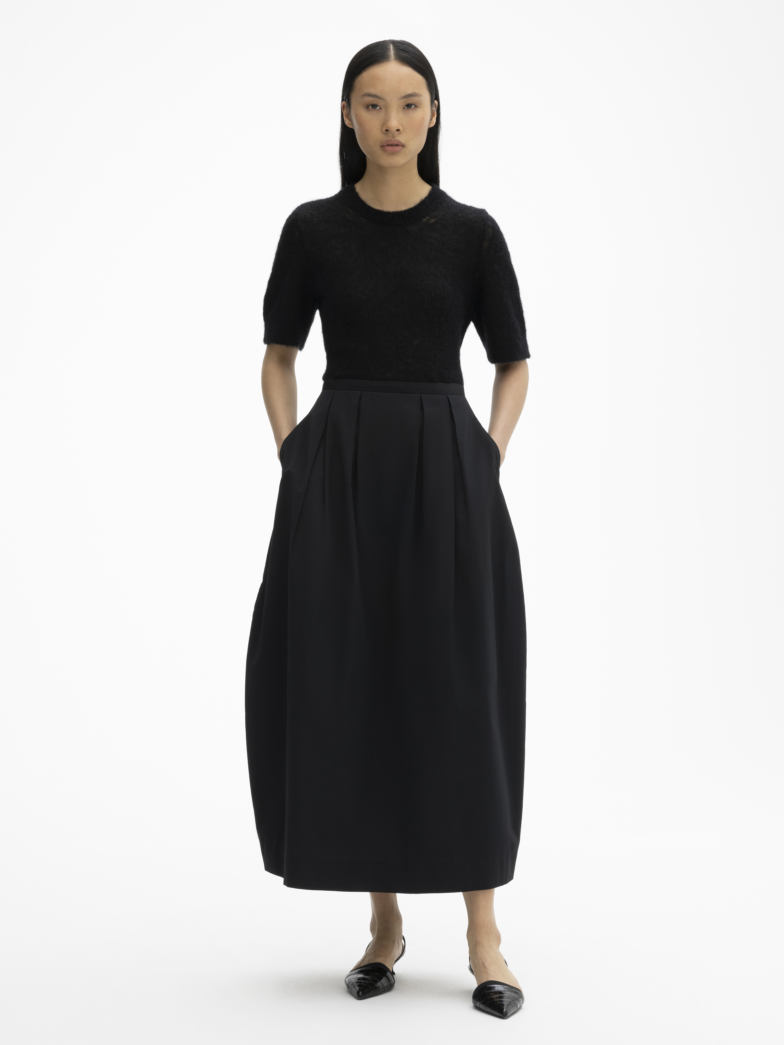 House Of Dagmar Curved Pleated Skirt In Black